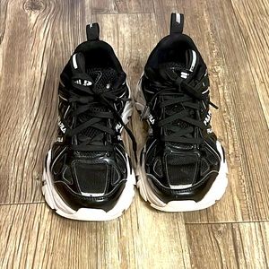 Fila interation sneakers in black and white